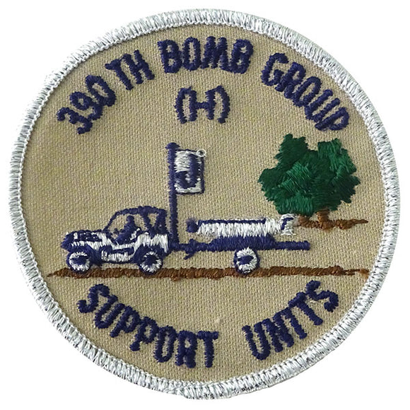 jacket patch a picture of a jeep towing a bomb, text around 390th bomb group (H) support units